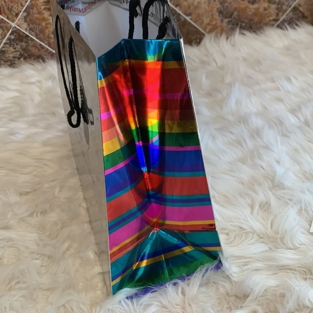 Dylan’s Candy Bar Paper Shopping Bags. One Black and One Silver Metallic.